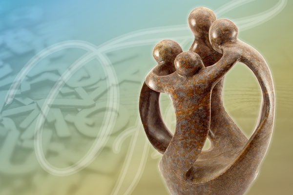 Image of a happy family stone sculpture overlaid on stylized background of fonts