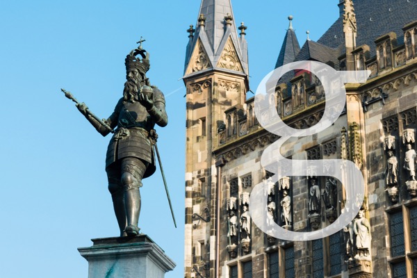 Image of Charlemagne statue with a lowercase g floating over the Aachen palace.