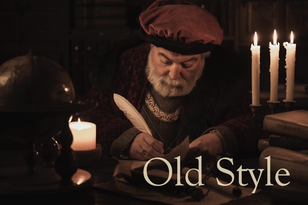 Picture of an Italian Renaissance scribe using a feather quill to write a manuscript by candlelight
